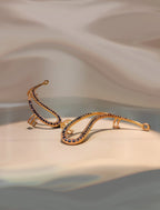 Celebrity Fancy Earring with Curved Gold Ear Cuff Design