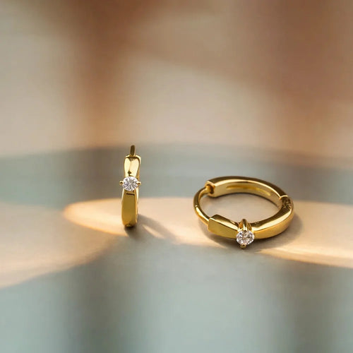 Gold plated sterling silver hoop earrings with white CZ accent