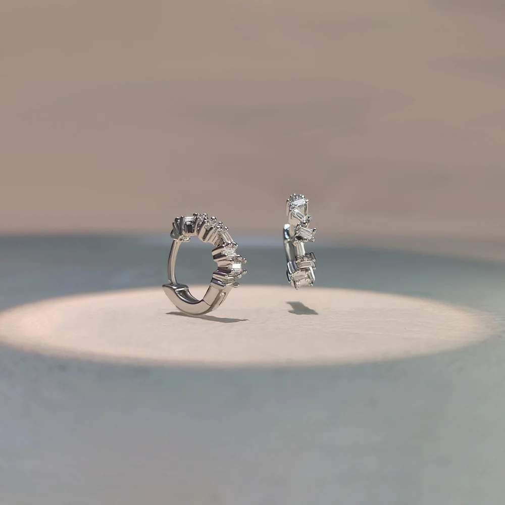 small hoop earrings with baguette cut diamonds