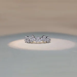 multi stone diamond ring with flower motifs