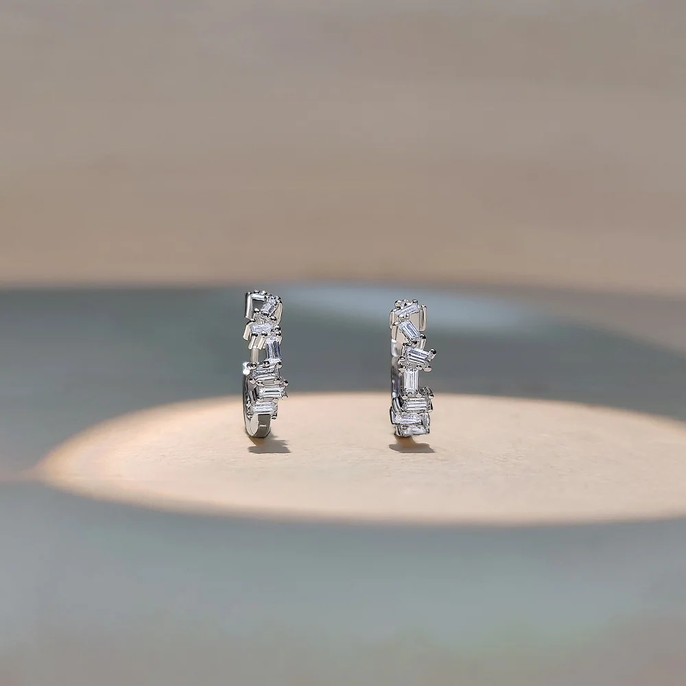 fine jewelry hoop earrings with baguette diamond design