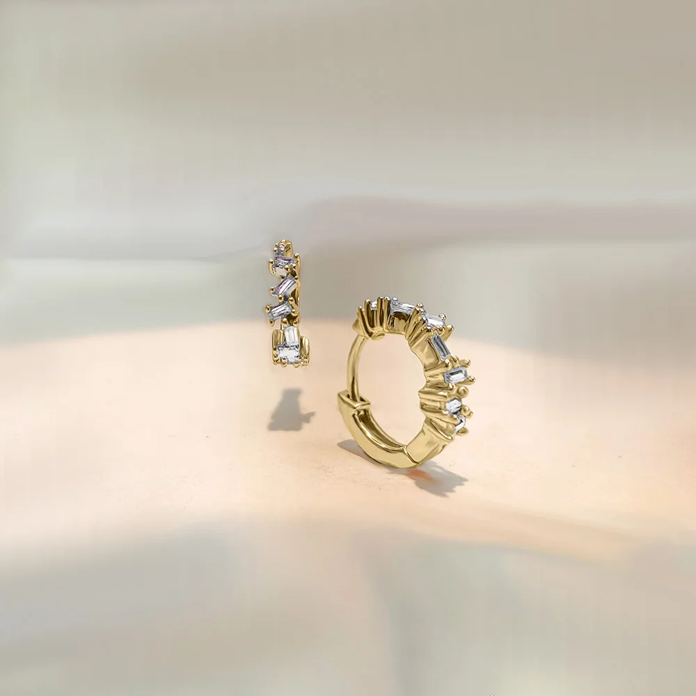 classic diamond huggie hoops with baguette accents